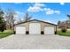 Exterior shot of the detached three-car garage with plenty of parking at 6611 Valley Mills Ave, Indianapolis, IN 46241