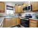 Updated kitchen features stainless steel appliances and plenty of counter space at 6611 Valley Mills Ave, Indianapolis, IN 46241