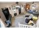 Open-concept living room with neutral tones, ceiling fans, and comfortable seating, creating a relaxing and inviting atmosphere at 6611 Valley Mills Ave, Indianapolis, IN 46241
