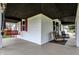 Relaxing front porch view with a swing, chairs, and ample space to unwind and enjoy the outdoors at 6611 Valley Mills Ave, Indianapolis, IN 46241