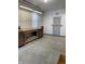 The workshop features a workbench, convenient for hobbyists and home improvement projects at 6816 Russett Dr, Plainfield, IN 46168