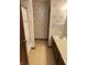 Bathroom with vanity, shower, and patterned wallpaper at 7164 Sandalwood Dr, Avon, IN 46123