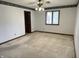 Spacious bedroom featuring a large window, neutral walls and plush carpeting at 7164 Sandalwood Dr, Avon, IN 46123
