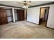 Spacious bedroom with hardwood doors, closet, and ensuite access at 7164 Sandalwood Dr, Avon, IN 46123