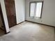 Bedroom featuring window and neutral walls at 7164 Sandalwood Dr, Avon, IN 46123