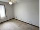 Bedroom with carpeted flooring and a bright window at 7164 Sandalwood Dr, Avon, IN 46123
