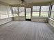 Inviting sunroom with large windows offering abundant natural light and views of the outdoors at 7164 Sandalwood Dr, Avon, IN 46123