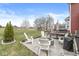 A landscaped backyard has a dining area, lounge furniture and a grill at 7254 Cambridge Pl, Avon, IN 46123