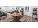 Full basement with comfortable seating, games, and bar area at 7254 Cambridge Pl, Avon, IN 46123
