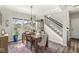 Elegant dining room with a wooden table and rug, perfect for Gathering gatherings at 7254 Cambridge Pl, Avon, IN 46123