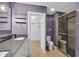 Bathroom featuring a double sink vanity, toilet, and a walk-in shower at 7383 Poppyseed Dr, Indianapolis, IN 46237