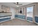 Well-lit bedroom with two-tone wall with guitars on the wall, window and carpeted floors at 7383 Poppyseed Dr, Indianapolis, IN 46237