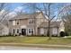 Attractive home with a well-manicured lawn, tasteful landscaping, and a welcoming front entrance at 7383 Poppyseed Dr, Indianapolis, IN 46237