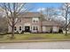 Charming two-story home featuring a landscaped yard, classic siding, and a welcoming front entrance at 7383 Poppyseed Dr, Indianapolis, IN 46237