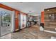 Open-concept kitchen and living area with modern cabinetry and abundant natural light at 7383 Poppyseed Dr, Indianapolis, IN 46237