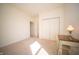 Bedroom featuring neutral colored carpet, a window, and a desk with chair at 7713 Imperial Eagle Dr, Zionsville, IN 46077