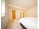 Bedroom featuring carpet, bright lighting, and access to a closet and bathroom at 7713 Imperial Eagle Dr, Zionsville, IN 46077