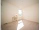 Empty bedroom space featuring carpet, a window, and a desk with chair at 7713 Imperial Eagle Dr, Zionsville, IN 46077