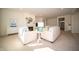 Cozy living space with a fireplace, neutral furnishings, and lots of natural light, creating an inviting atmosphere at 7713 Imperial Eagle Dr, Zionsville, IN 46077