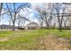 Spacious backyard featuring a well-maintained lawn at 7845 Bluff Rd, Indianapolis, IN 46217