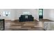 Spacious living room featuring neutral colors and wood flooring at 7845 Bluff Rd, Indianapolis, IN 46217