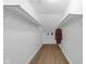 Large walk-in closet features hardwood floors and organized shelving at 7845 Bluff Rd, Indianapolis, IN 46217