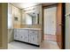 Bathroom vanity with ample storage and tile flooring at 8151 Taunton Rd, Indianapolis, IN 46260