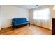 Bright bedroom with wood flooring, perfect as a guest room or cozy living space at 8151 Taunton Rd, Indianapolis, IN 46260