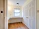 Bedroom with desk area, closet and window providing natural light at 8151 Taunton Rd, Indianapolis, IN 46260