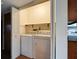 Convenient laundry closet with washer and dryer, seamlessly integrated into the home's design at 8151 Taunton Rd, Indianapolis, IN 46260