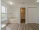Bathroom with large tub, closet and window offering natural light at 10309 Buckshire Ln, Indianapolis, IN 46234