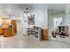 Open floor plan kitchen featuring decorative tin style ceiling with accent furniture and stainless appliances at 10573 W 550 N, Thorntown, IN 46071