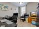 Bright office featuring neutral walls, textured ceiling, and a large window for natural light at 10573 W 550 N, Thorntown, IN 46071