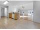 Open kitchen featuring wooden cabinets and modern appliances, seamlessly connected to the spacious living area at 13381 N White Cloud Ct, Camby, IN 46113