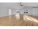 Bright living room with vaulted ceilings, hardwood floors, and large windows offering plenty of natural light at 13381 N White Cloud Ct, Camby, IN 46113
