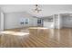 Spacious and open living area featuring beautiful hardwood floors and abundant natural light at 13381 N White Cloud Ct, Camby, IN 46113