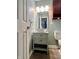 Bathroom featuring a modern vessel sink, vanity, and a wall-mounted cabinet at 1426 Ripplewood Dr, Danville, IN 46122