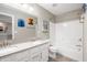 Bright bathroom with double sink vanity, tub shower, and neutral paint at 15046 Sullivan Ln, Westfield, IN 46074