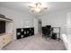 Bedroom with light-grey walls, carpet, and furniture for storage and work at 15046 Sullivan Ln, Westfield, IN 46074
