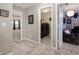 Hallway with doorways to the bedroom and laundry room with modern washer and dryer at 15046 Sullivan Ln, Westfield, IN 46074