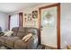 Comfortable living room with a plush sofa and decorative accents at 1617 S N St, Elwood, IN 46036