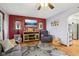 Cozy living room with large screen television and view into the kitchen at 1617 S N St, Elwood, IN 46036