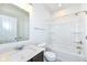 Bathroom featuring a shower-tub combo and granite vanity at 18203 Sunbrook Way, Westfield, IN 46074