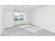 Bright bedroom featuring a large window and neutral carpet at 18203 Sunbrook Way, Westfield, IN 46074