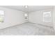 Bedroom with neutral walls, carpet, and two windows at 18203 Sunbrook Way, Westfield, IN 46074