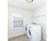Functional laundry room with side-by-side washer and dryer at 18203 Sunbrook Way, Westfield, IN 46074