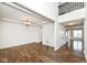Bright living room featuring hardwood floors, natural light, and modern fixtures at 18203 Sunbrook Way, Westfield, IN 46074