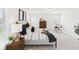 Bright main bedroom with modern decor, soft carpet, and neutral furnishings at 18203 Sunbrook Way, Westfield, IN 46074