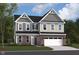 Charming two-story home with a brick-accented facade and an attached two-car garage at 20342 Hudson Bay Ln, Westfield, IN 46074