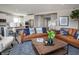Inviting living room with comfortable seating, stylish decor, and a view into the kitchen at 20342 Hudson Bay Ln, Westfield, IN 46074